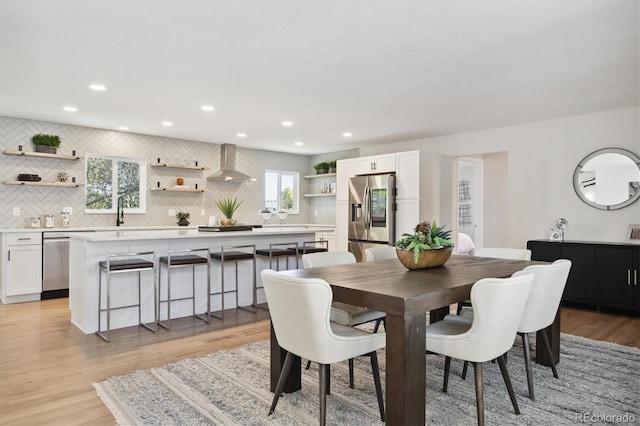 dining area featuring light hardwood / wood-style floors