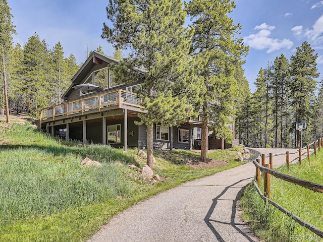 32663 Donna Dr, Conifer, CO 80433 - view of side of property featuring a wooden deck