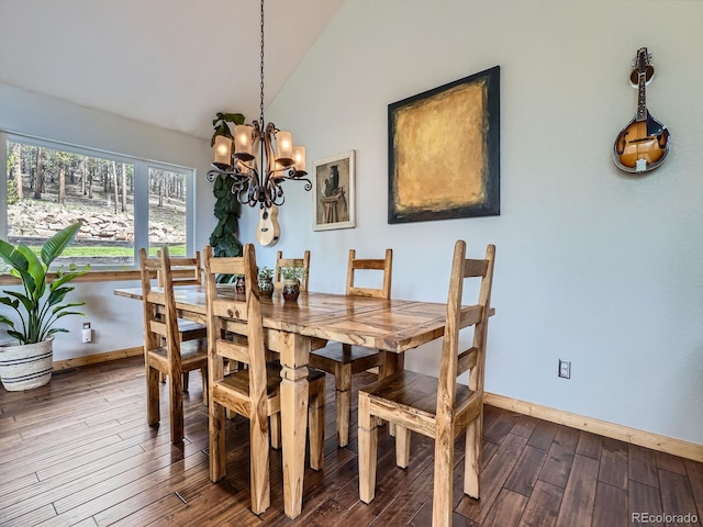 32663 Donna Dr, Conifer, CO 80433 - dining area with dark wood-style floors, a chandelier, and lofted ceiling