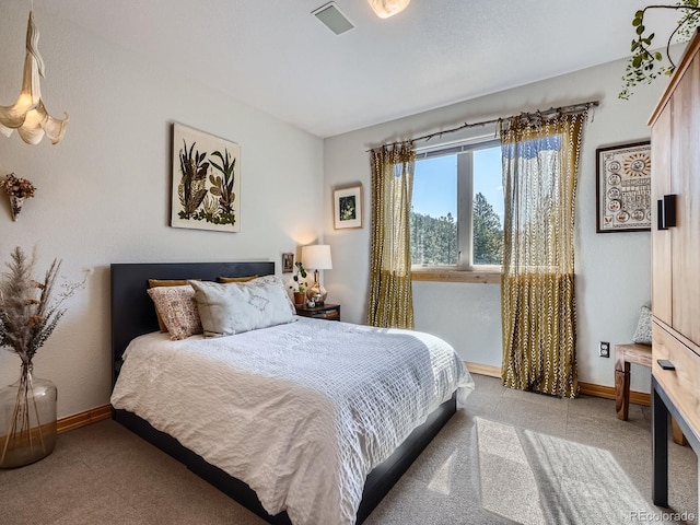32663 Donna Dr, Conifer, CO 80433 - carpeted bedroom with baseboards