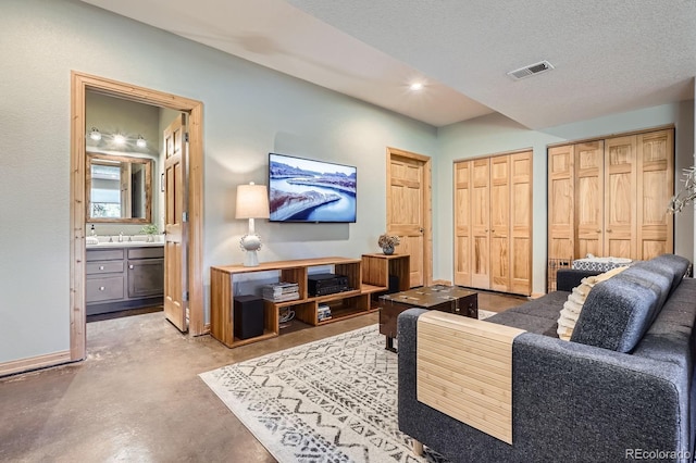 32663 Donna Dr, Conifer, CO 80433 - living area with concrete flooring and recessed lighting