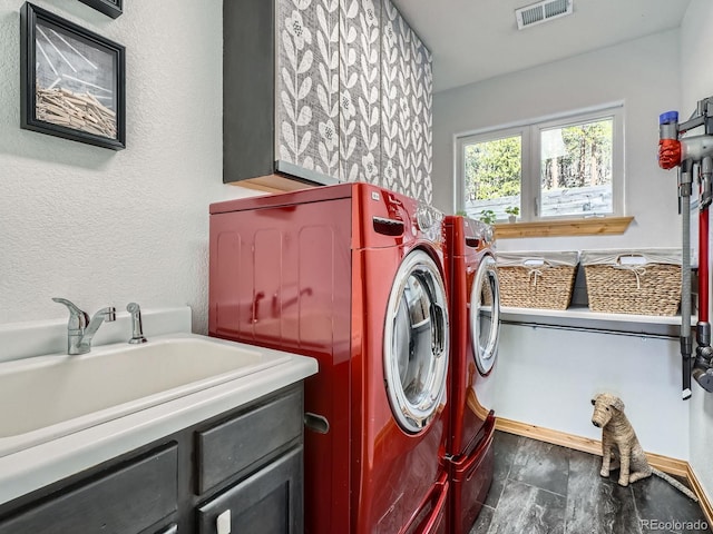 32663 Donna Dr, Conifer, CO 80433 - washroom with cabinet space and washer and dryer