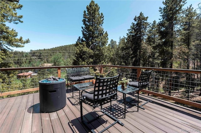 32663 Donna Dr, Conifer, CO 80433 - deck featuring a forest view