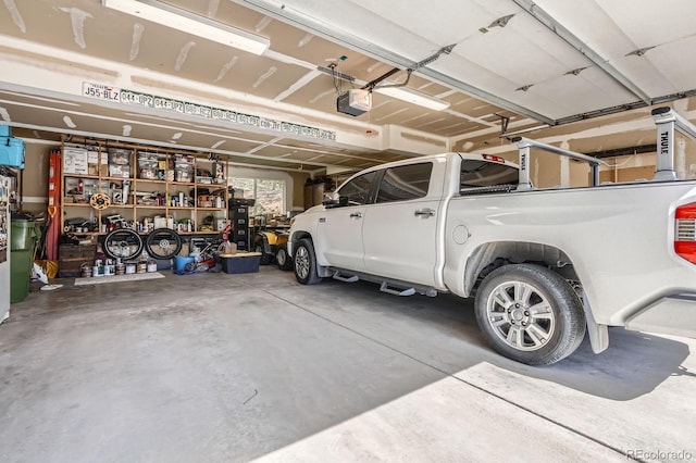 32663 Donna Dr, Conifer, CO 80433 - garage featuring a garage door opener
