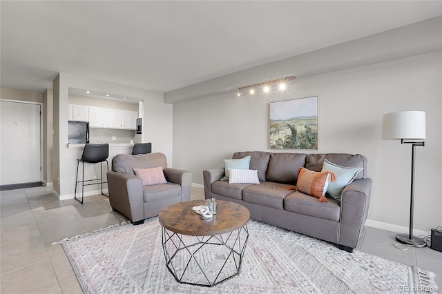 living room featuring light tile patterned flooring