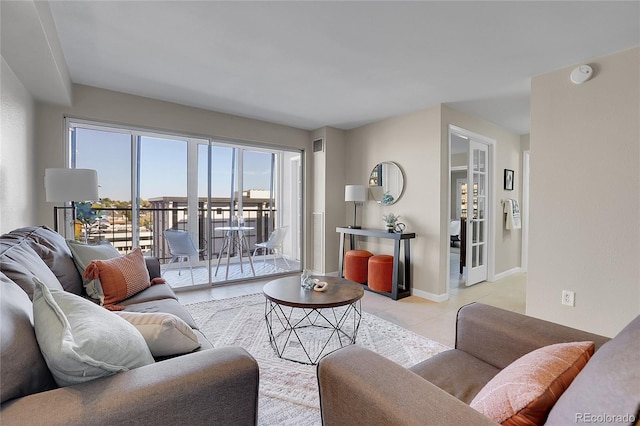 living room featuring light tile patterned flooring