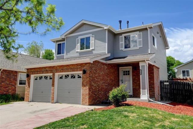 3769 Dahlia St, Denver, CO 80207 - view of front facade with brick siding, an attached garage, and driveway