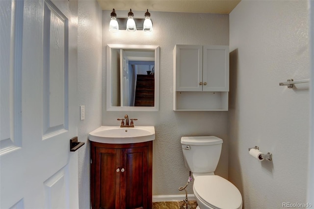 3769 Dahlia St, Denver, CO 80207 - bathroom featuring toilet and vanity