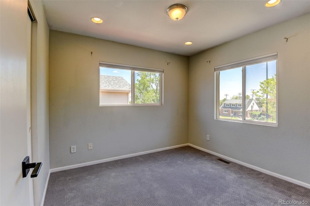 3769 Dahlia St, Denver, CO 80207 - unfurnished room featuring carpet flooring, baseboards, and recessed lighting