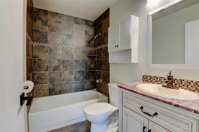 3769 Dahlia St, Denver, CO 80207 - full bathroom with toilet, tub / shower combination, vanity, and backsplash