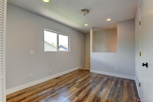 3769 Dahlia St, Denver, CO 80207 - empty room featuring recessed lighting, wood finished floors, and baseboards