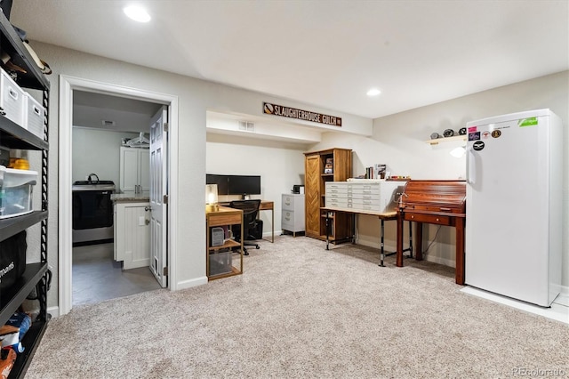 carpeted office space with recessed lighting, washer / dryer, baseboards, and visible vents
