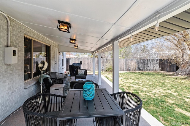 view of patio / terrace featuring outdoor dining space, a fenced backyard, and outdoor lounge area