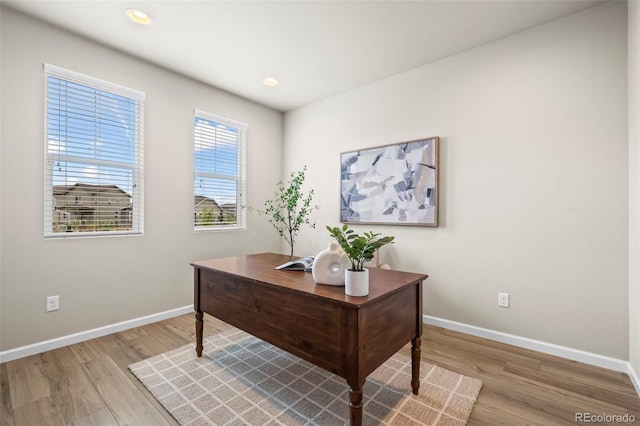 1677 Meagan Way, Erie, CO 80516 - home office with baseboards, light wood-style floors, and recessed lighting