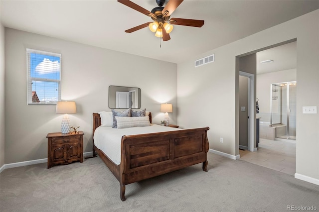 1677 Meagan Way, Erie, CO 80516 - bedroom featuring carpet flooring, baseboards, connected bathroom, and ceiling fan