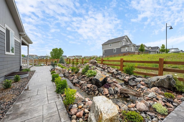1677 Meagan Way, Erie, CO 80516 - view of yard featuring a residential view