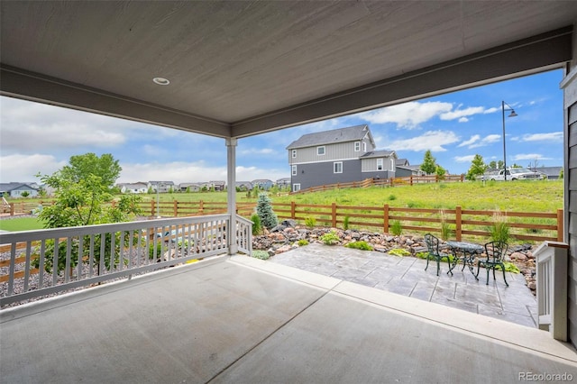 1677 Meagan Way, Erie, CO 80516 - view of patio / terrace with a residential view