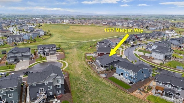 1677 Meagan Way, Erie, CO 80516 - aerial overview of property's location with nearby suburban area