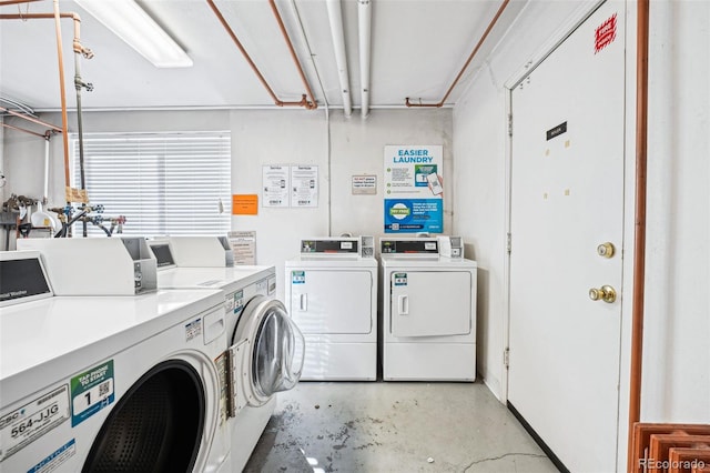 common laundry area with independent washer and dryer