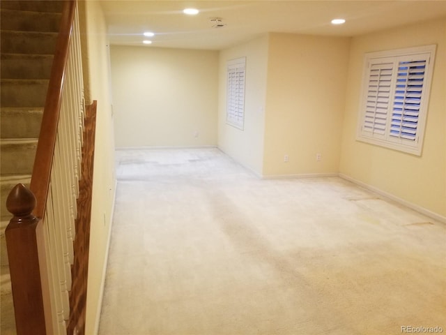 unfurnished room featuring carpet flooring