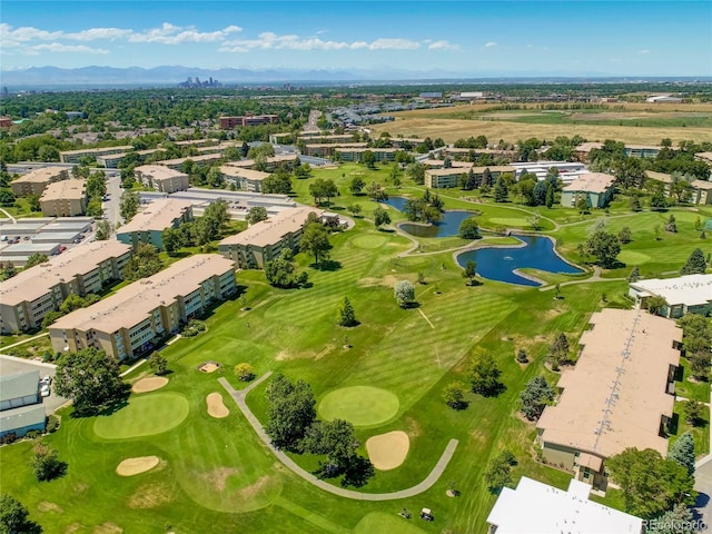 bird's eye view with a water and mountain view