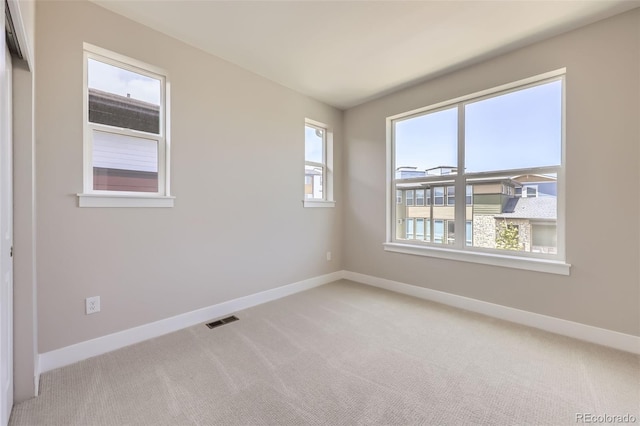 858 Promenade Dr, Superior, CO 80027 - empty room featuring baseboards and light carpet