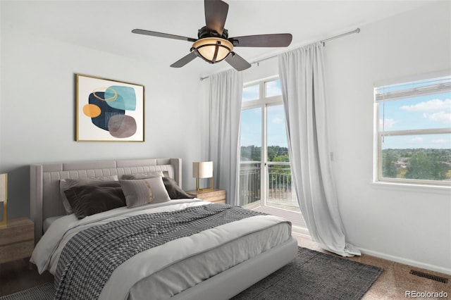 bedroom featuring ceiling fan and access to outside