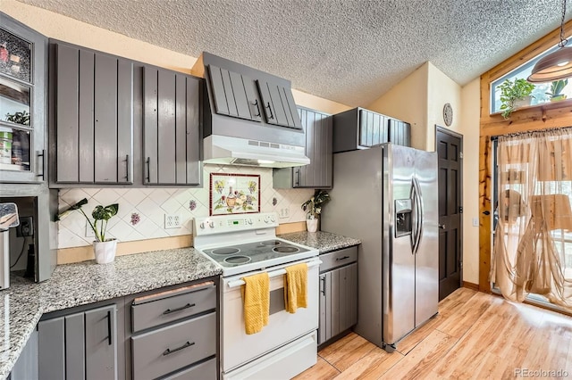 kitchen with tasteful backsplash, a textured ceiling, stainless steel refrigerator with ice dispenser, under cabinet range hood, and white electric range oven