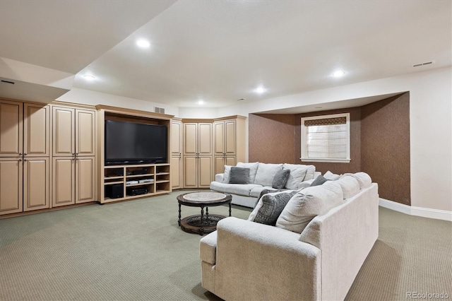 living area with recessed lighting, light carpet, visible vents, and baseboards