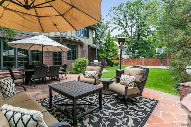 view of patio with fence and an outdoor living space