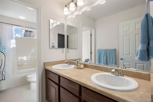 full bathroom featuring shower / bathtub combination with curtain, vanity, toilet, and tile patterned flooring