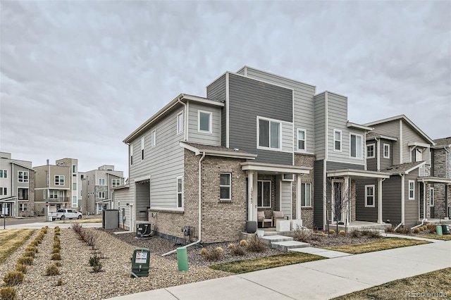 12345 Festival Ln, Thornton, CO 80241 - view of front facade with brick siding and a residential view