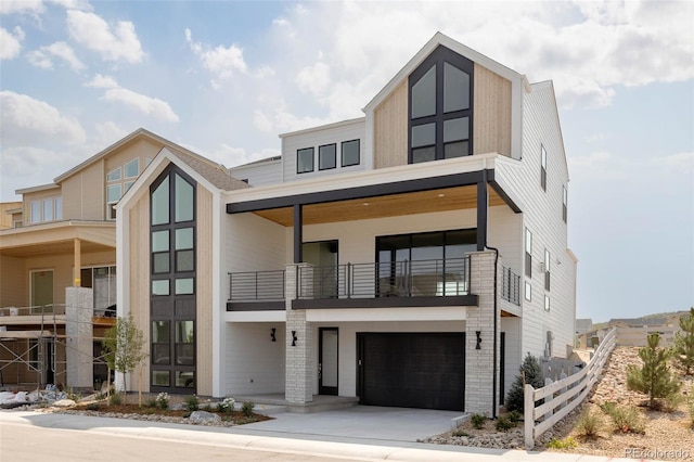 modern home with driveway and an attached garage