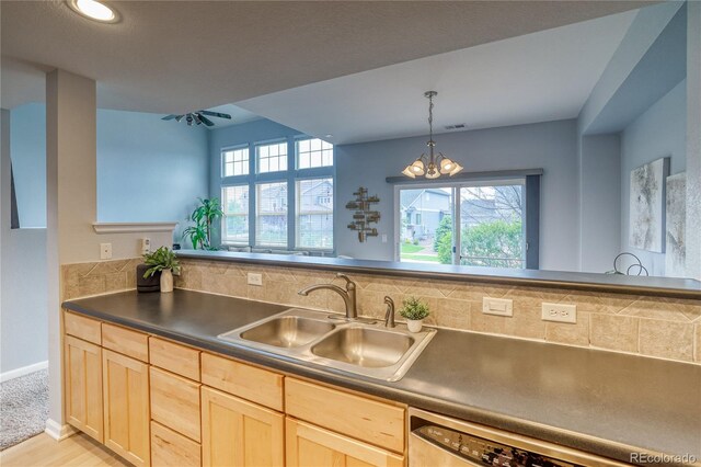 23070 York Ave, Parker, CO 80138 - kitchen featuring a sink, light brown cabinetry, dark countertops, and dishwasher
