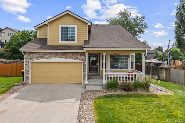 10530 Mount Columbia Pl, Parker, CO 80138 - view of front facade with a porch, roof with shingles, driveway, an attached garage, and stone siding