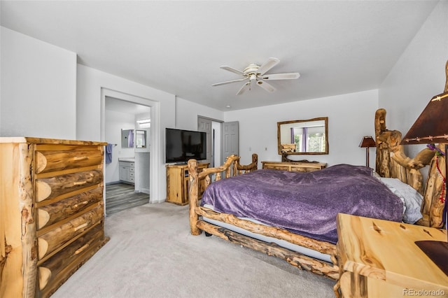 10530 Mount Columbia Pl, Parker, CO 80138 - bedroom featuring light colored carpet, connected bathroom, and ceiling fan