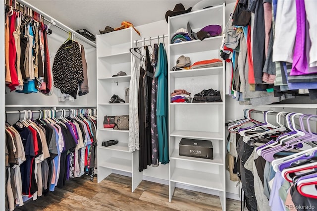 10530 Mount Columbia Pl, Parker, CO 80138 - walk in closet featuring wood finished floors
