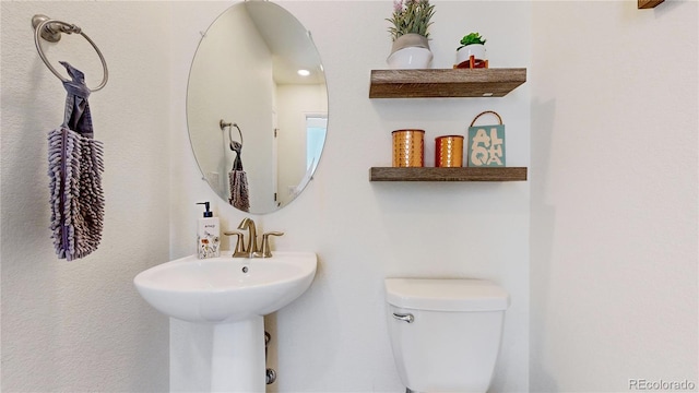 14074 Jackson St, Thornton, CO 80602 - bathroom with toilet and a sink