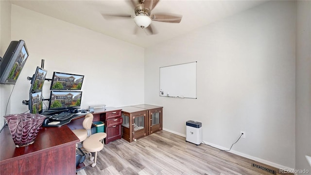14074 Jackson St, Thornton, CO 80602 - home office with light wood-style flooring and ceiling fan