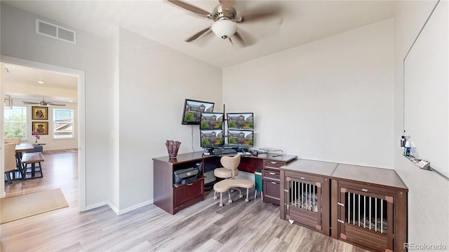 14074 Jackson St, Thornton, CO 80602 - home office featuring a ceiling fan and light wood-style floors