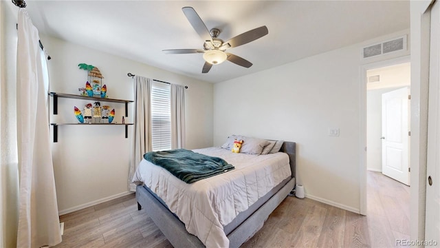 14074 Jackson St, Thornton, CO 80602 - bedroom featuring wood finished floors and a ceiling fan