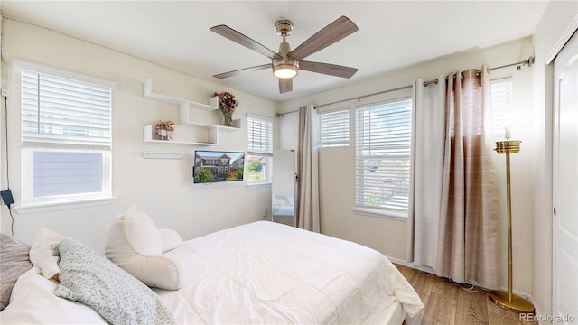 14074 Jackson St, Thornton, CO 80602 - bedroom with wood finished floors and ceiling fan