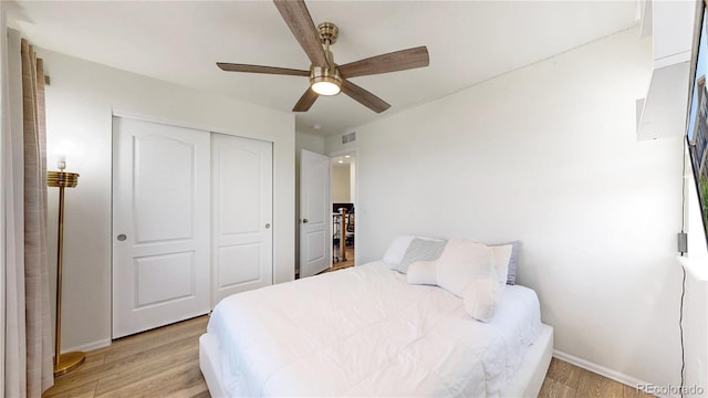 14074 Jackson St, Thornton, CO 80602 - bedroom with light wood finished floors, a closet, and ceiling fan