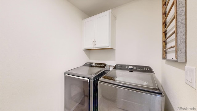 14074 Jackson St, Thornton, CO 80602 - laundry room featuring cabinet space and separate washer and dryer
