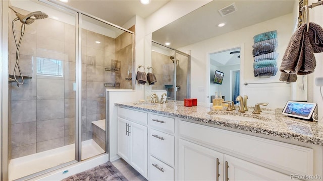 14074 Jackson St, Thornton, CO 80602 - bathroom with double vanity and a stall shower