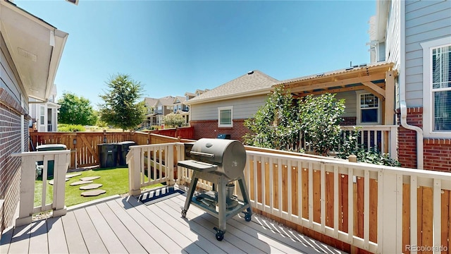 14074 Jackson St, Thornton, CO 80602 - wooden terrace with grilling area and a residential view