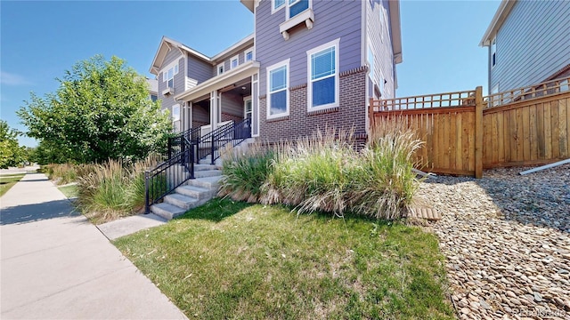 14074 Jackson St, Thornton, CO 80602 - view of front facade with brick siding