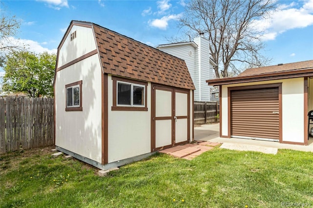 10550 Routt St, Westminster, CO 80021 - view of shed featuring a fenced backyard