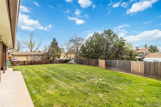 10550 Routt St, Westminster, CO 80021 - view of yard with a fenced backyard and a residential view