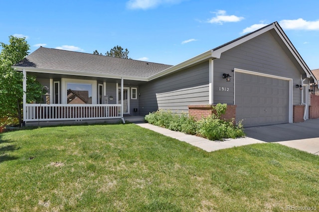 ranch-style house featuring an attached garage, a front yard, a porch, roof with shingles, and driveway